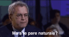 a man in a suit and tie is asking ma a te pare naturale