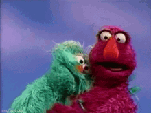 sesame street muppets kiss hug love