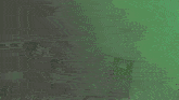 a group of green birds are flying in the air in a green background .