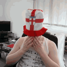 a person wearing a hat that says england
