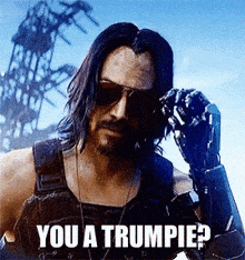 a man wearing sunglasses and a robotic arm is asking if he is a trumpie .