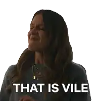 a woman says that is vile while wearing a necklace