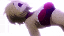 a woman is laying on her back with her mouth open and a red top on