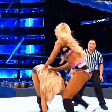 Carmella Beating Up GIF - Carmella Beating Up Charlotte Flair GIFs
