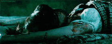 a woman is laying on the ground with a snake wrapped around her and the words trust the woman on the bottom