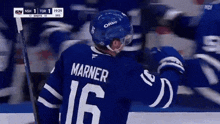 a hockey player with the name marner on his jersey