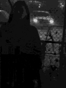 a black and white photo of a man 's face