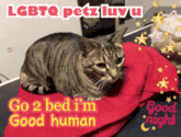 a cat laying on a red blanket with the words go 2 bed i 'm good human on the bottom