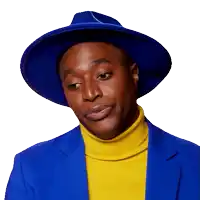 man wearing a blue hat and a yellow turtleneck