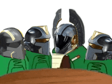 a group of soldiers are sitting around a table and one of them is wearing a helmet that says ' i '