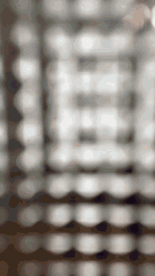 a blurred image of a building with a lot of lights on it