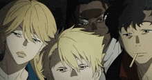 a group of anime characters are standing next to each other and looking at the camera .