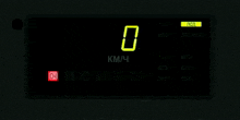 a digital display displays the number 0 and says km / 4