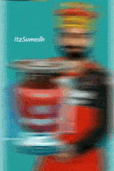 a blurry picture of a person with the words itzsumedh on the bottom right