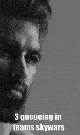 a black and white photo of a man with the words 3 queuing in teams skywars on the bottom