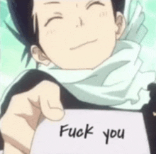 a boy is holding a piece of paper that says " fuck you " .