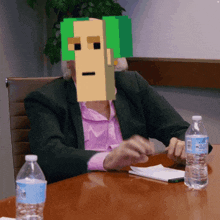 a bottle of aquafina water sits on a table next to a man in a suit