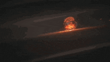 a cartoon character is holding a sword in a dark room with fire coming out of it 's mouth .