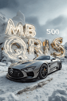 a silver mercedes is in the snow with the words mb qris 500 above it
