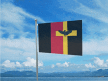 a flag with a cross and eagle on it