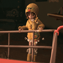 a cartoon girl wearing a yellow hoodie and a knitted hat