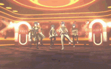 a group of anime characters are dancing in a room with a sign that says u on it