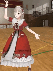 a girl in a red dress is dancing in a gym .