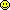 a pixel art of a yellow smiley face with a sad look on its face .