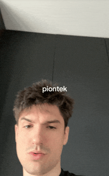 a man 's head is shown with the word piontek above it