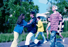 a group of people are dancing on a street and the word pierce is on the bottom