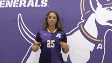 a girl wearing a purple shirt with the number 25 on it