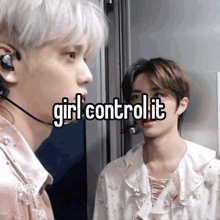 a couple of men standing next to each other with the words girl control it written on them