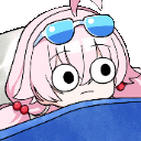 a girl wearing sunglasses is laying in a bed .