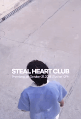 a poster for steal heart club shows a man in a blue shirt