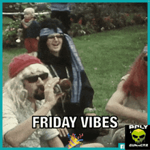a group of people are sitting in the grass with the words friday vibes on the bottom