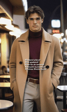 a man in a tan coat and a red sweater