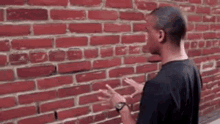 Guy Talking To Brick Wall Fast Talking GIF - Guy Talking To Brick Wall Fast Talking Alone GIFs