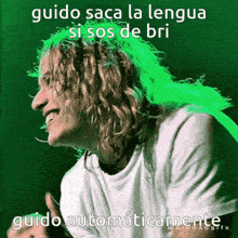 a picture of a man with green hair says guido saca la lengua si sos de bri guido automaticamente
