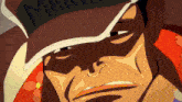 a close up of a man wearing a hat that has the word marine on it