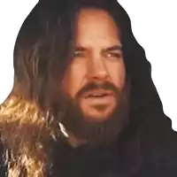 a man with long hair and a beard makes a funny face