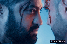 two men are looking at each other with blood on their faces and the words 7wickreddy on the bottom