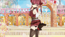 a girl in a red outfit is dancing in front of a ferris wheel