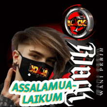 a man wearing a face mask with the words assalamua-laikum on it