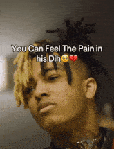 a picture of a young man with dreadlocks and the words you can feel the pain in his dil