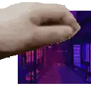 a close up of a person 's hand holding a purple object in front of a purple background .