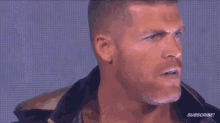 a close up of a man 's face with a purple background and the words subscribe on the bottom