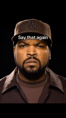 ice cube is wearing a hat that says la
