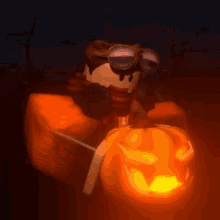 a person is holding a carved pumpkin in their hand .