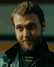 a close up of a man 's face with the words te amo efsun on the bottom