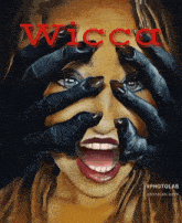 a painting of a woman covering her eyes with her hands and the word wicca in red